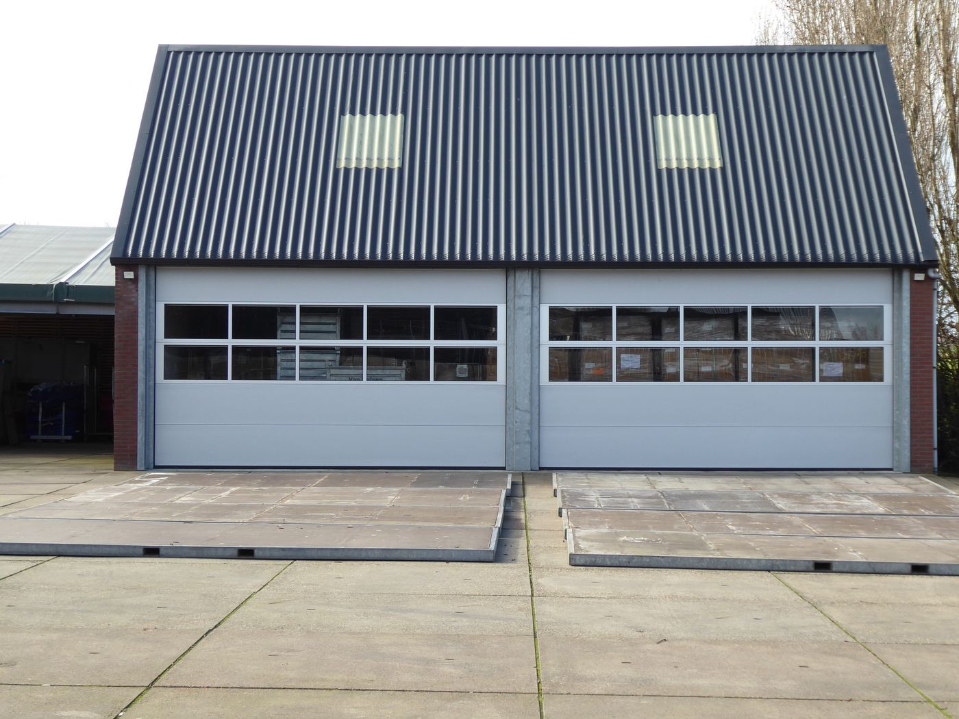 Metal roof and doors on an industrial building exterior